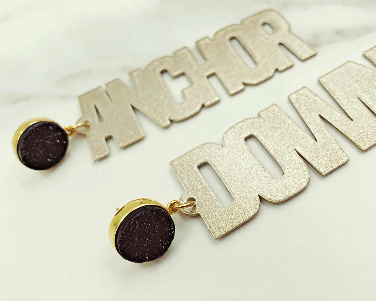vanderbilt_gold_tone_anch_1-1.webp Vanderbilt Gold Tone ANCHOR DOWN Earrings with Black Druzy-Brianna Cannon Outlet